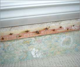 Rusted tack strip, an indicator of moisture and mold